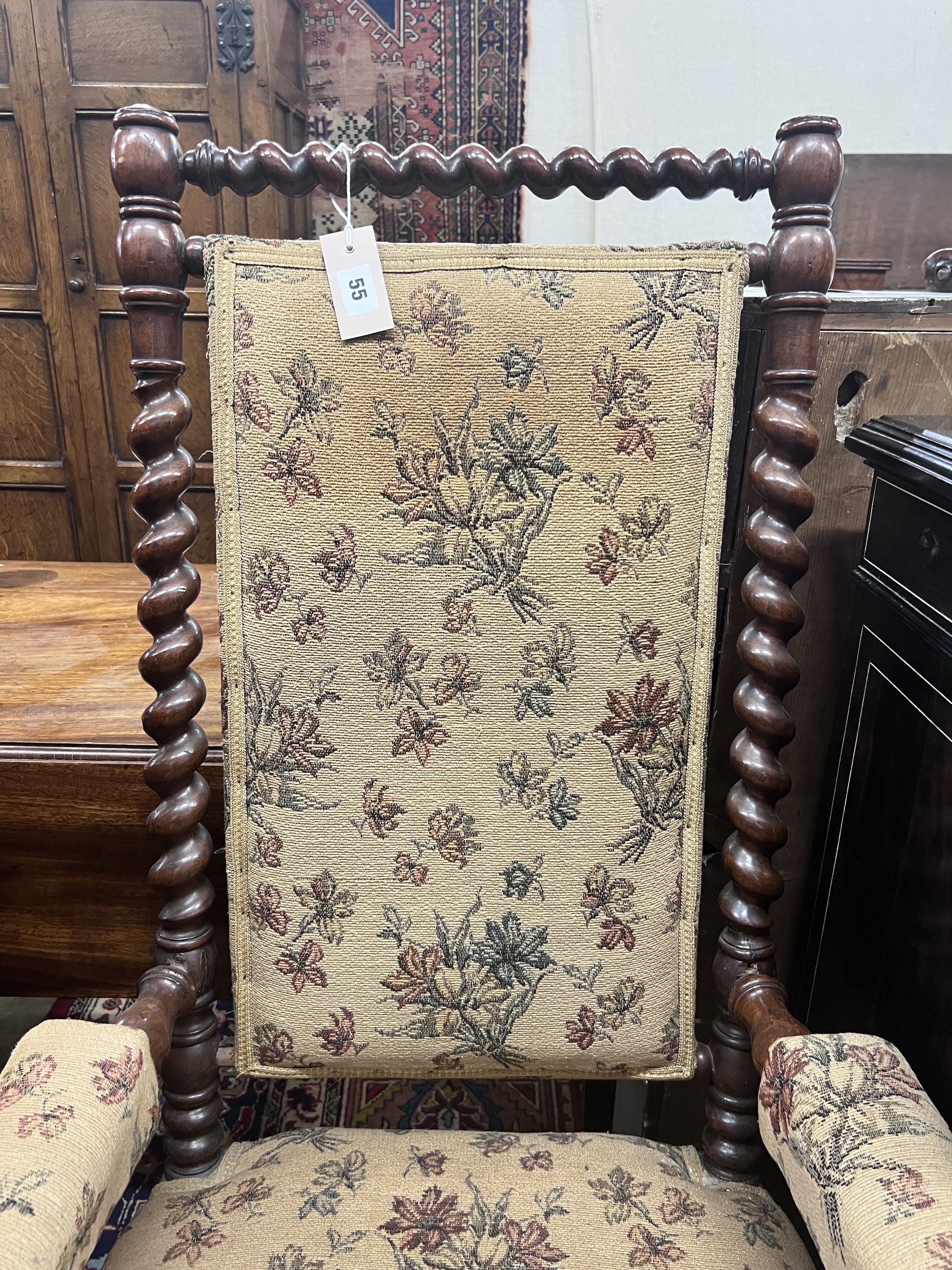 A Victorian carved spiral turned mahogany armchair, width 60cm, depth 60cm, height 118cm